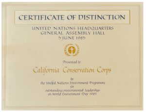 Scanned image, reads Certificate of Distinction, United Nations Headquarters, General Assembly Hall, 5 June 1985, Prested to California Conservation Corps by the United National Environment Programme for outstanding environmental leadership on World Environment Day 1985