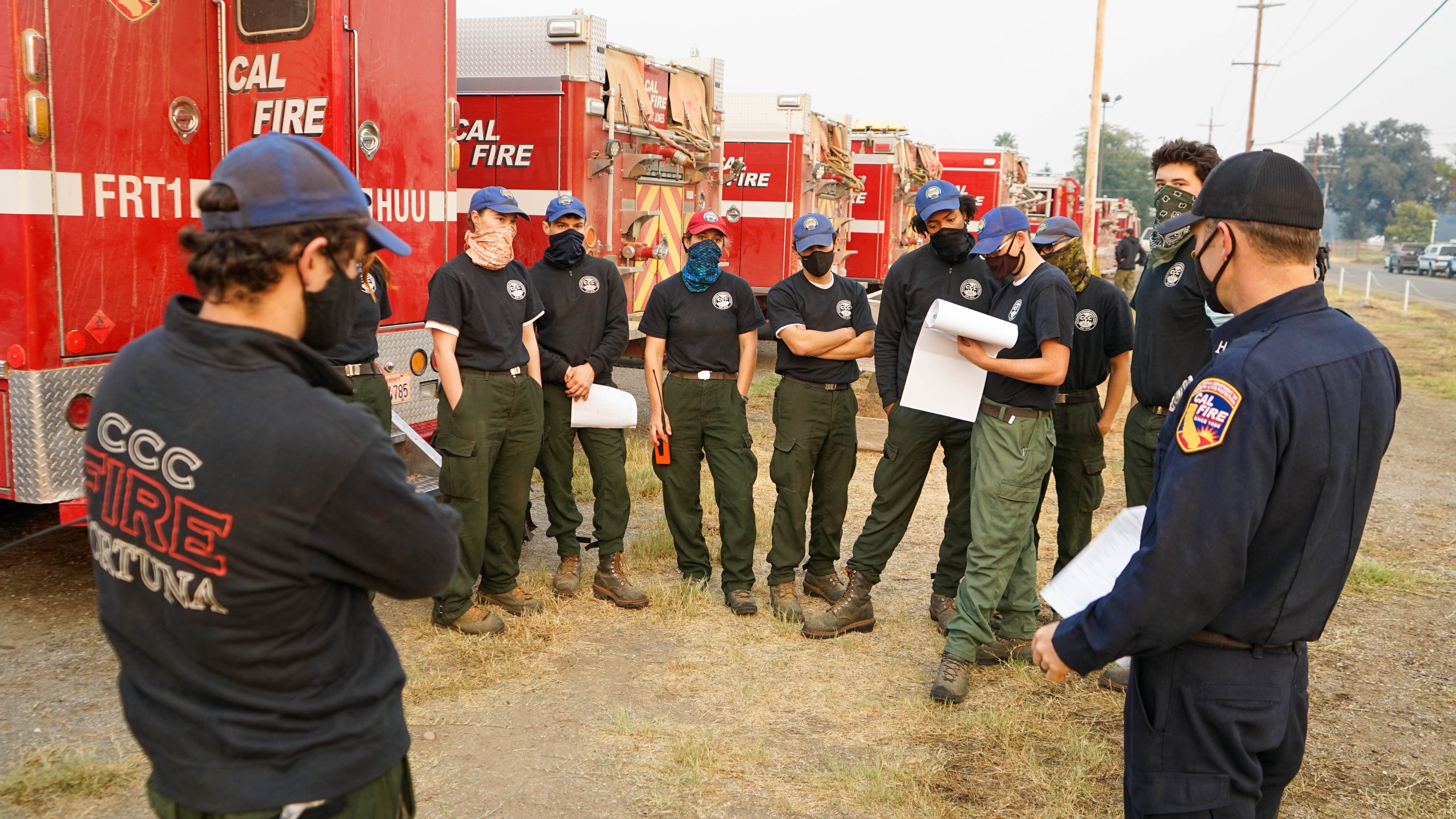 CCC Fortuna corpsmembers circled around during their safety tailgate meeting.