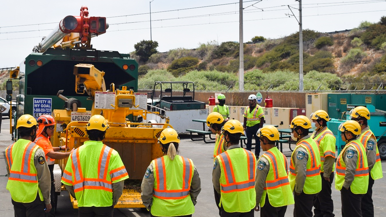 San Diego Center Corpsmembers getting trained on chain saw safety.