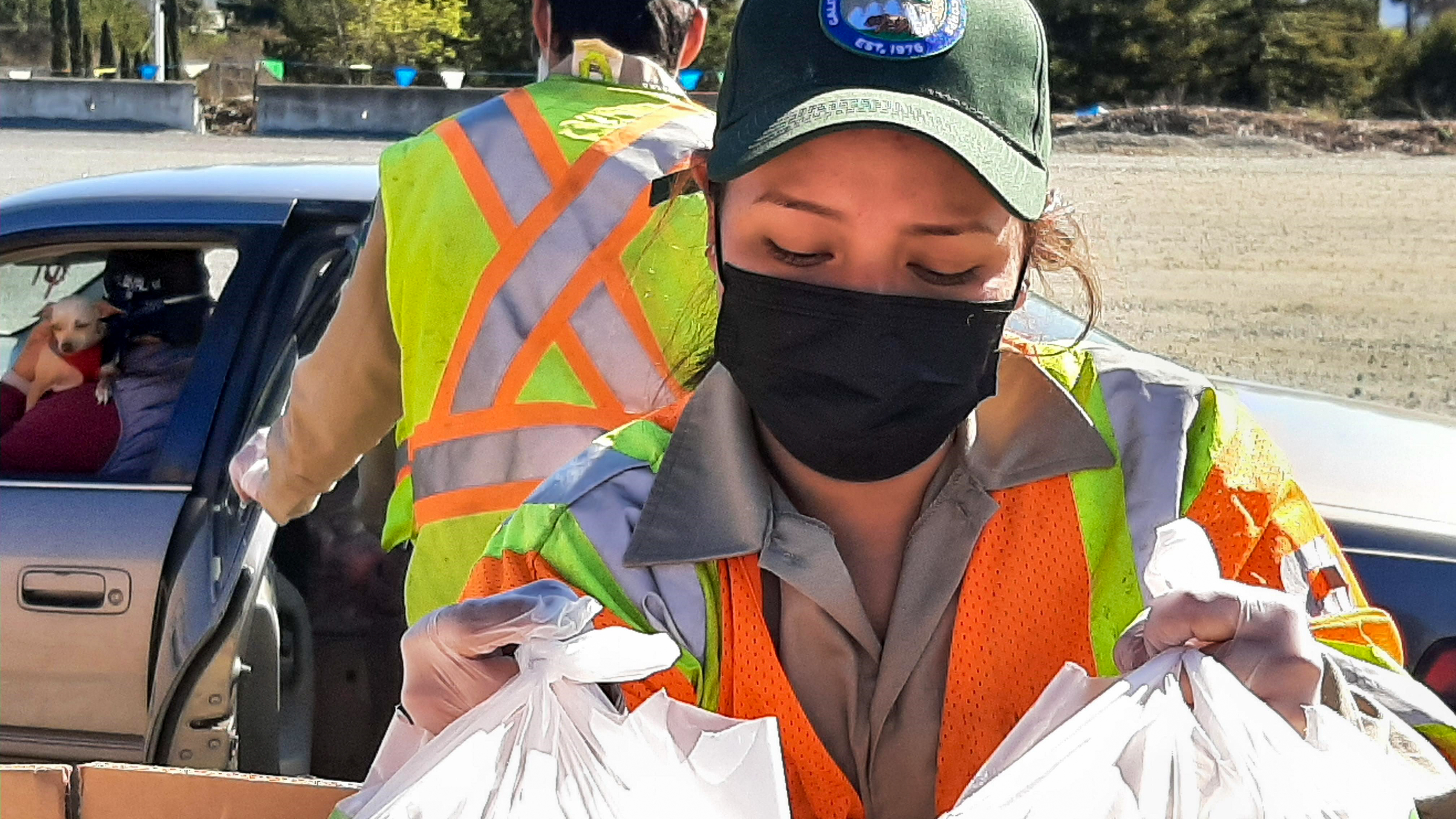 Corpsmembers from the Monterey Bay Center restoring a habitat on Bird Island.