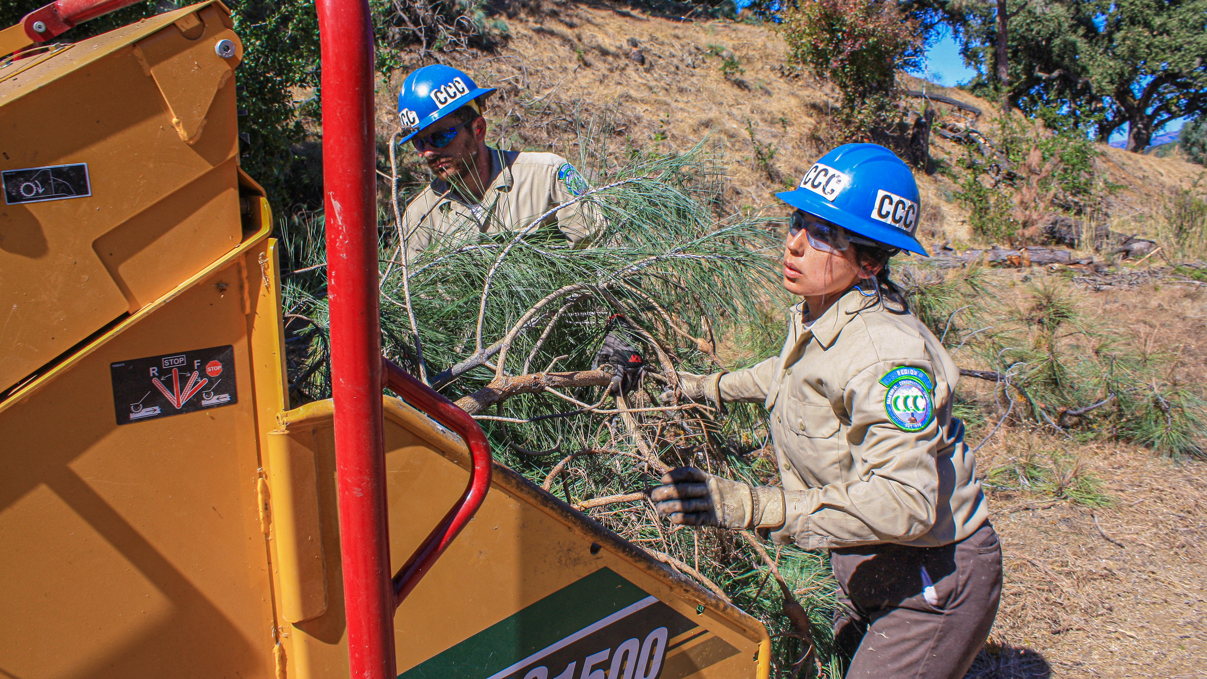 Corpsmembers at the Monterey Bay Center using a variety of tools. 