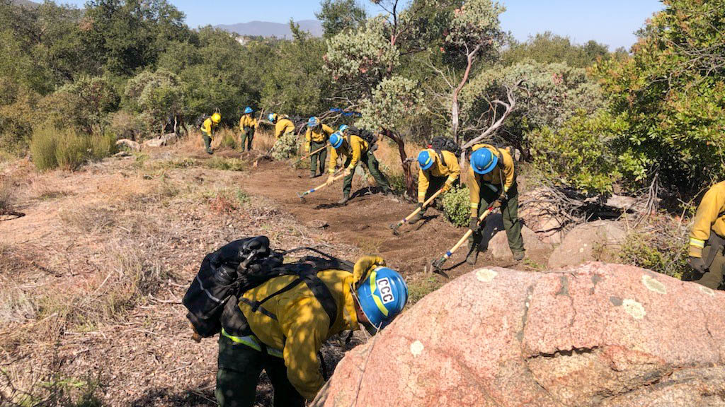 Los Piños Center wildland firefighting Corpsmembers train how to build fire lines.