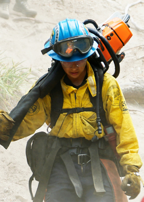 SideImage_Pomona_500x700 Pomona Corpsmember Samantha Alarcon hiking down a hill