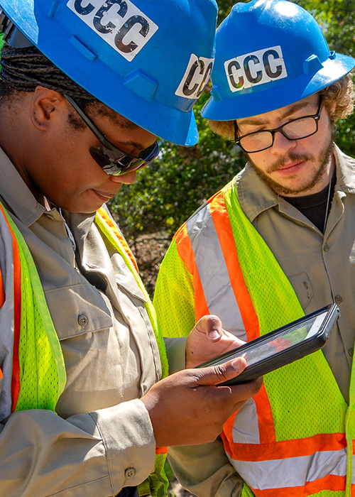SideImage_Redding_500x700 Two Corpsmembers tracking data with an ipad.