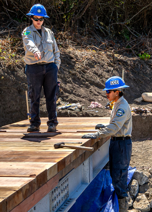 SideImage_Solano_500x700 Corpsmembers working on a bridge.