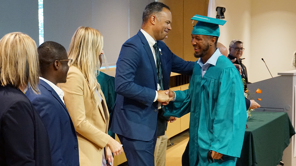 Highschool_Graduation_Keith_1040x585 Keith shaking hands with Jp during graduation.