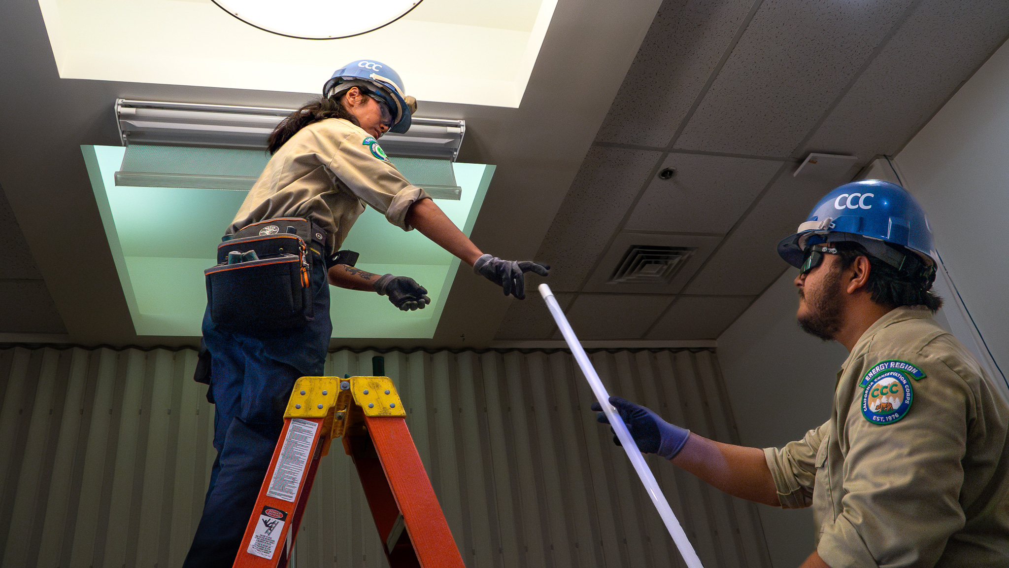 CCC Sacramento Corpsmembers install LED lighting.