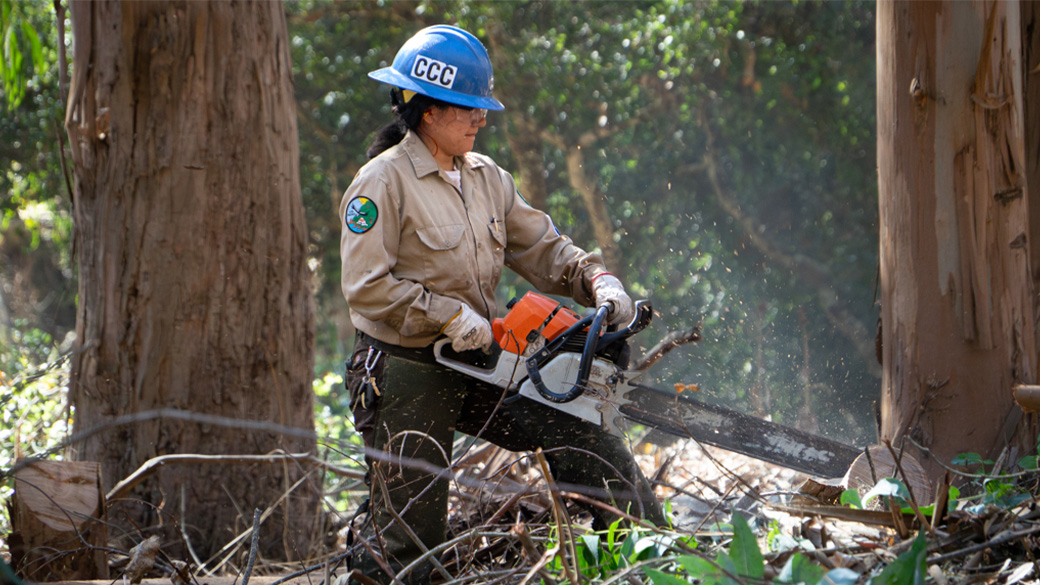 Corpsmember with chainsaw.