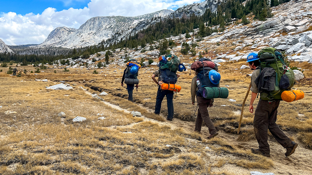 corpsmembers hiking in a line