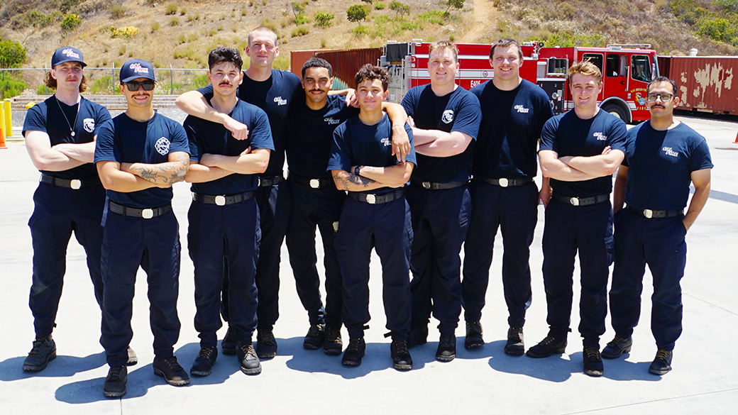 portrait of ten men in cal fire t-shirts