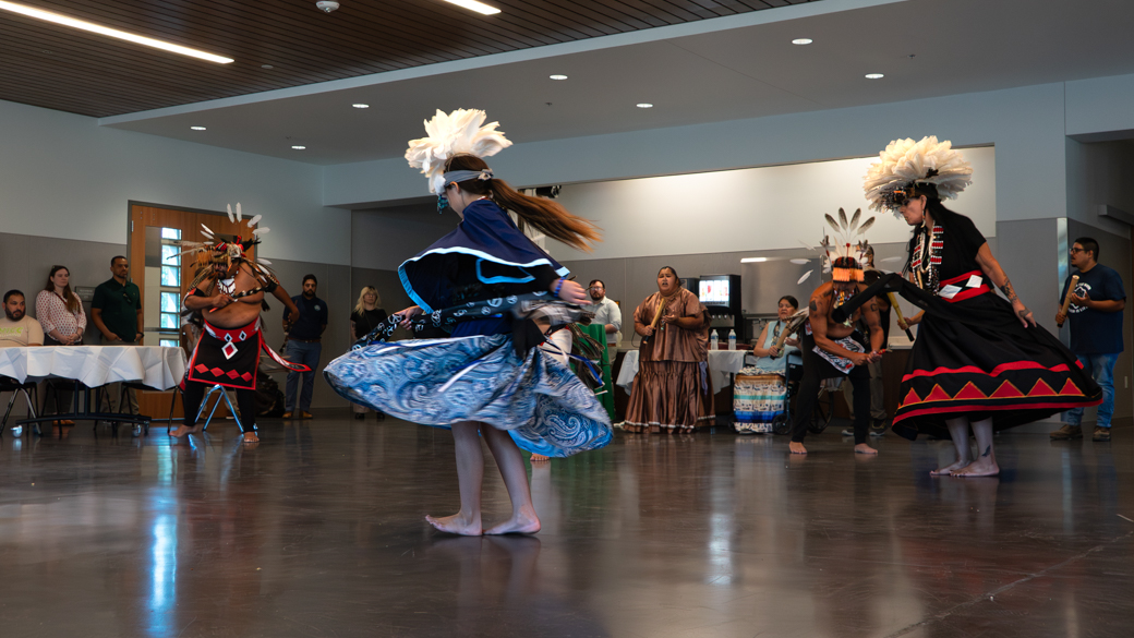 Round Valley Feather Dancers from Round Valley Indian Reservation dance in the Mendocino Center Dining Hall