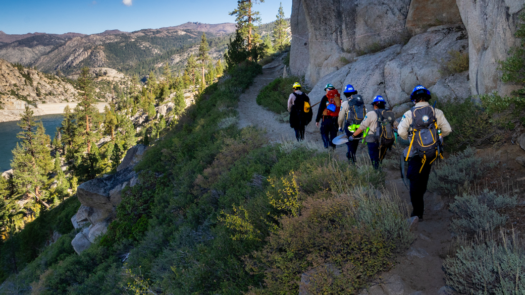 CCC Delta crew hiking in Emigrant Wilderness past Relief Reservoir.