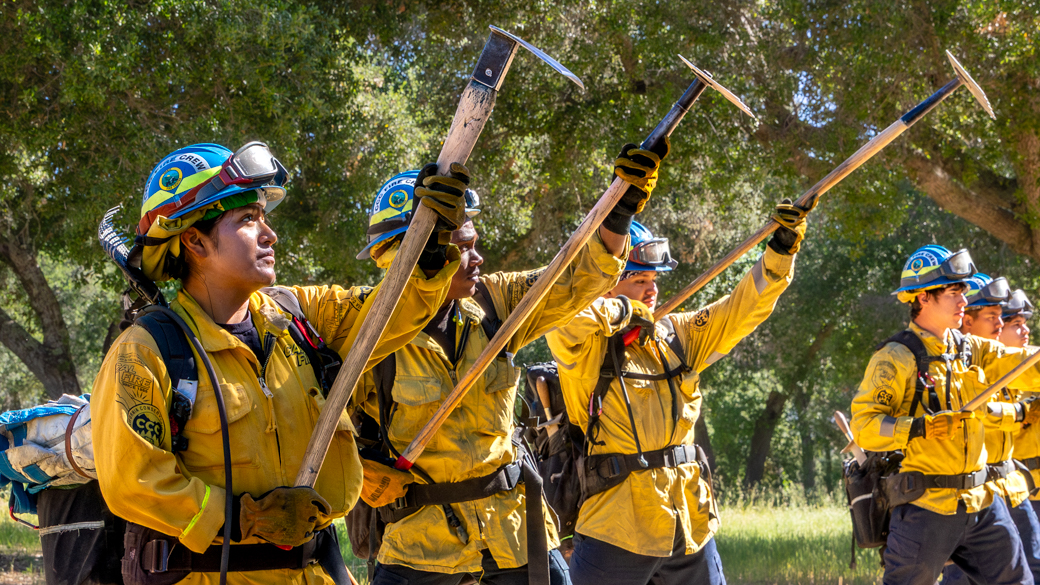CCC Corpsmmebers display their line tools during a "Hot Tool Out" exercise.