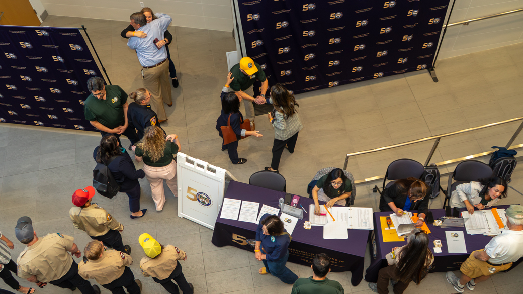Attendees check into CCC's Golden Anniversary Event. 