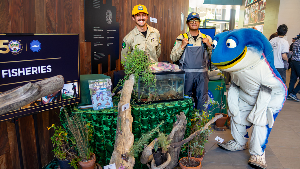 Sammy the Steelhead visits the CCC's Fisheries Booth.